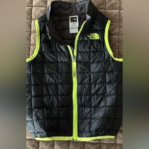 The North Face Black Quilted Vest with Neon Yellow Trim